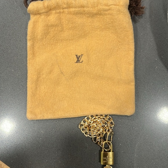 Louis Vuitton lock and key w/ chain - Picture 4 of 4